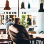 old man sitting in coffee shop