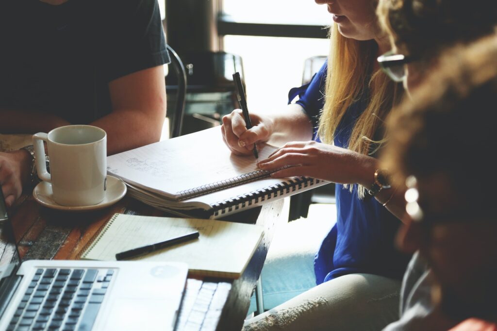 group of people meeting around a table