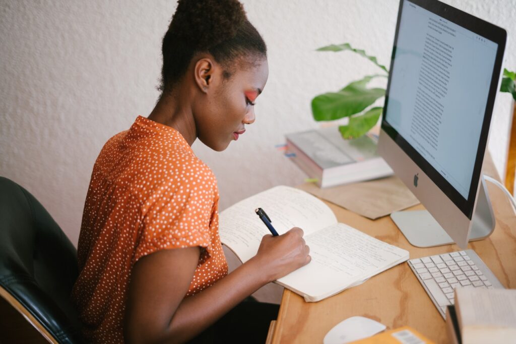 woman working in front of her computer