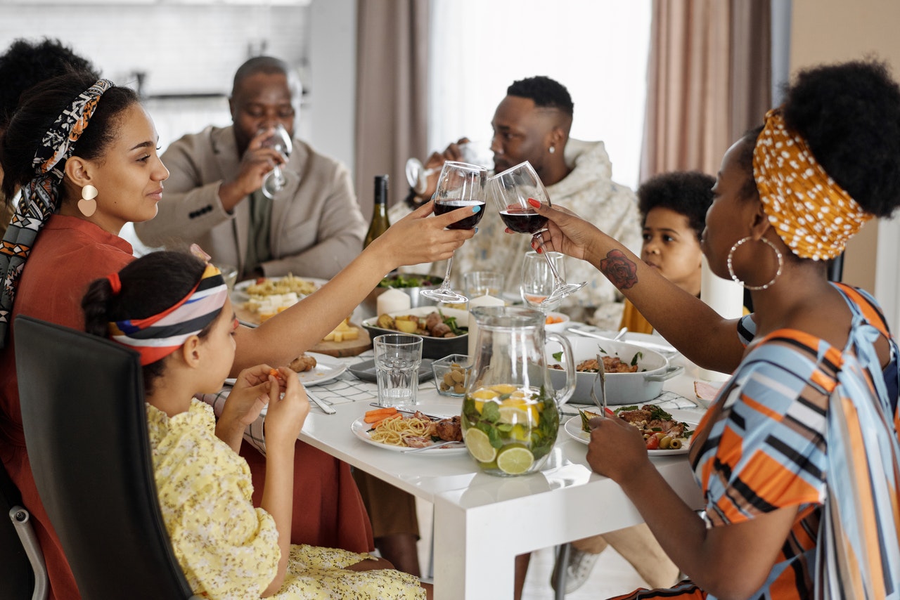 black family enjoying dinner together