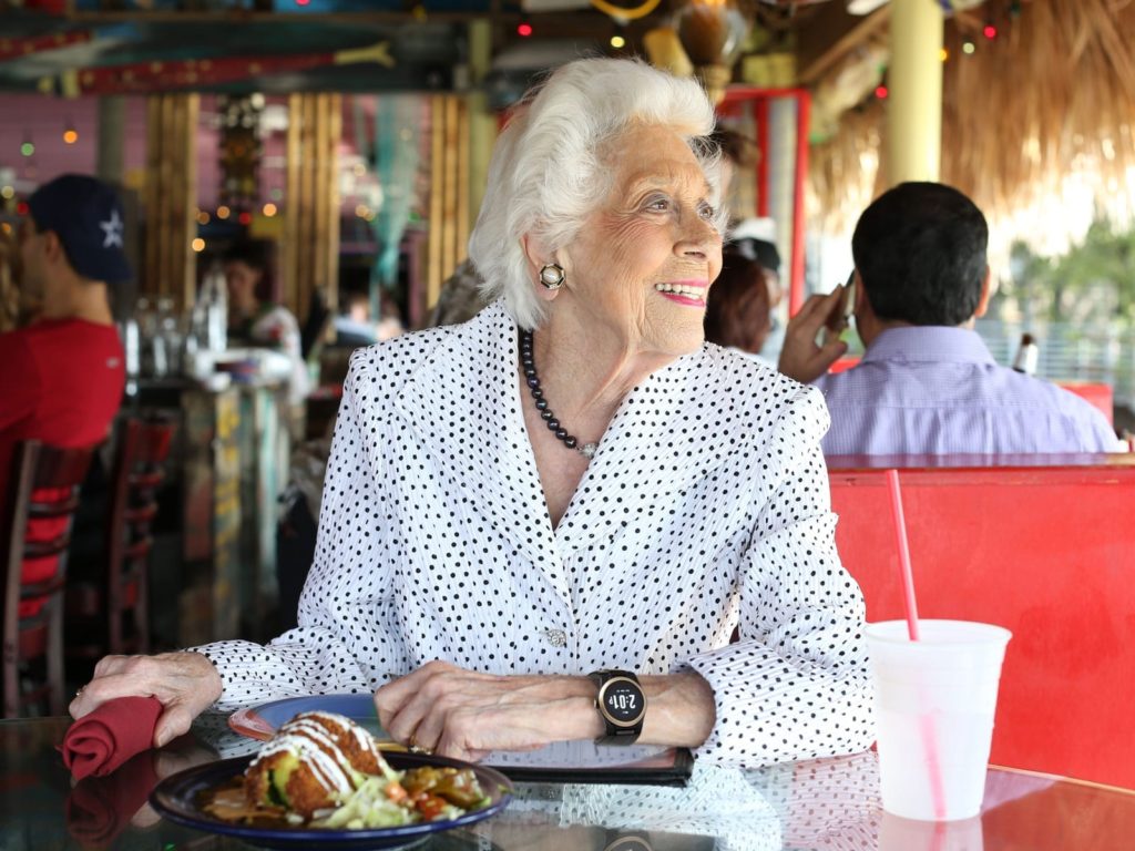 smiling old woman wearing Kanega Watch