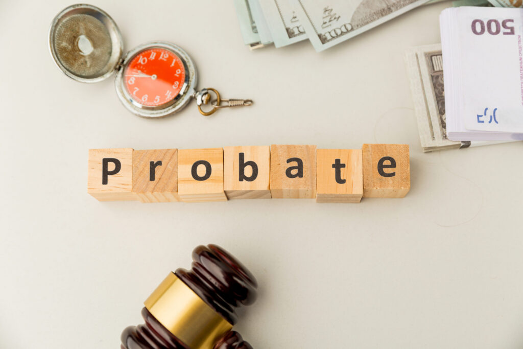 probate spelled out on letter blocks with legal gavel and cash