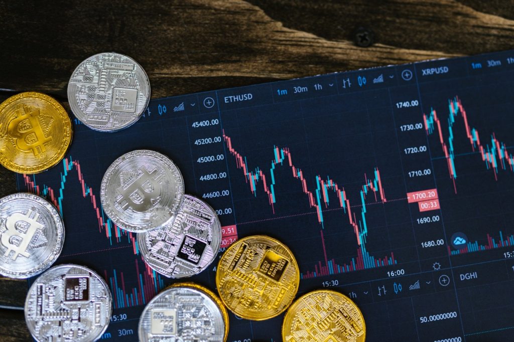 cryptocurrency coins on a stock market background