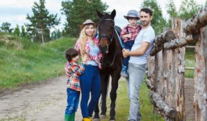 young family with horse